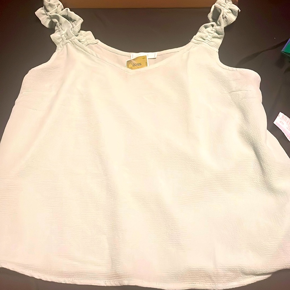 Light blue sheer tank top.